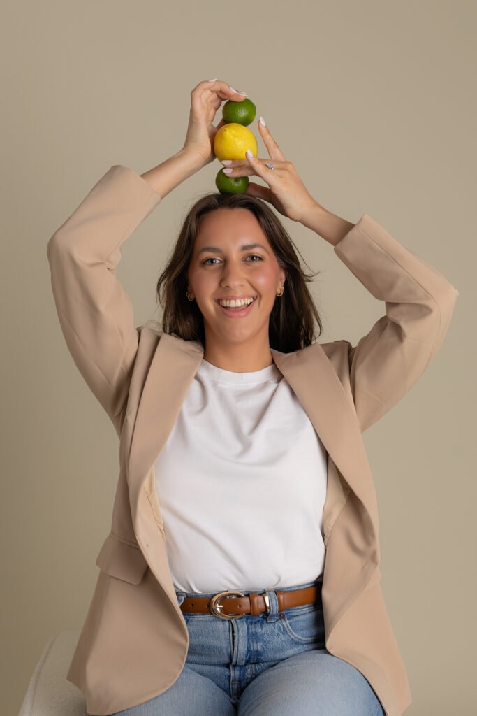 NutriAlly Owner Lydia Fruit Head Smiling